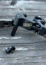 Load image into Gallery viewer, Hardware that needs to be added to the unused lanyard hole to make the Release hold magnetically into the mount